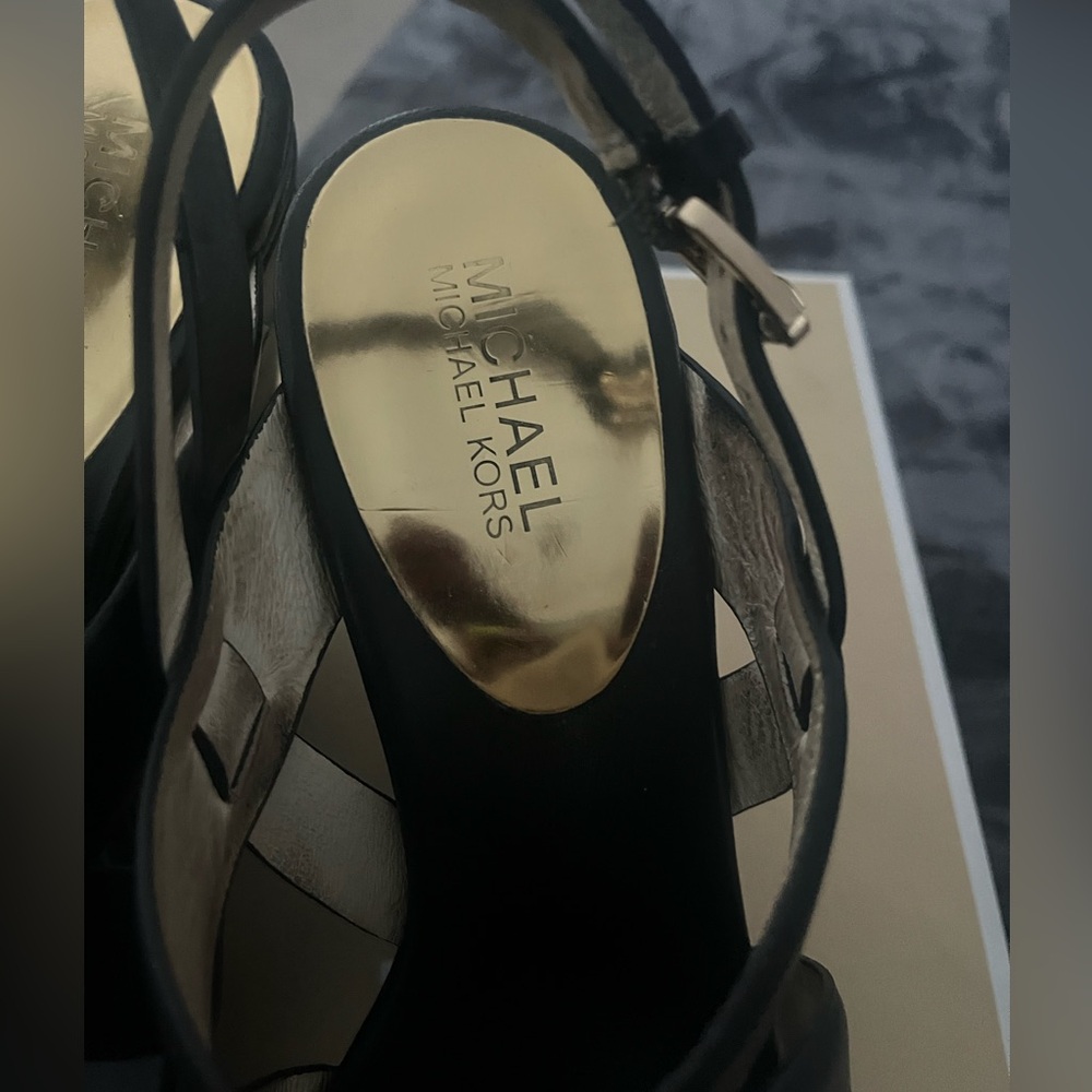 Black genuine leather Micheal Kors wedge sandal  size 10.  Worn